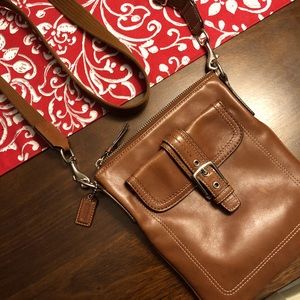 Brown leather coach mini cross body bag